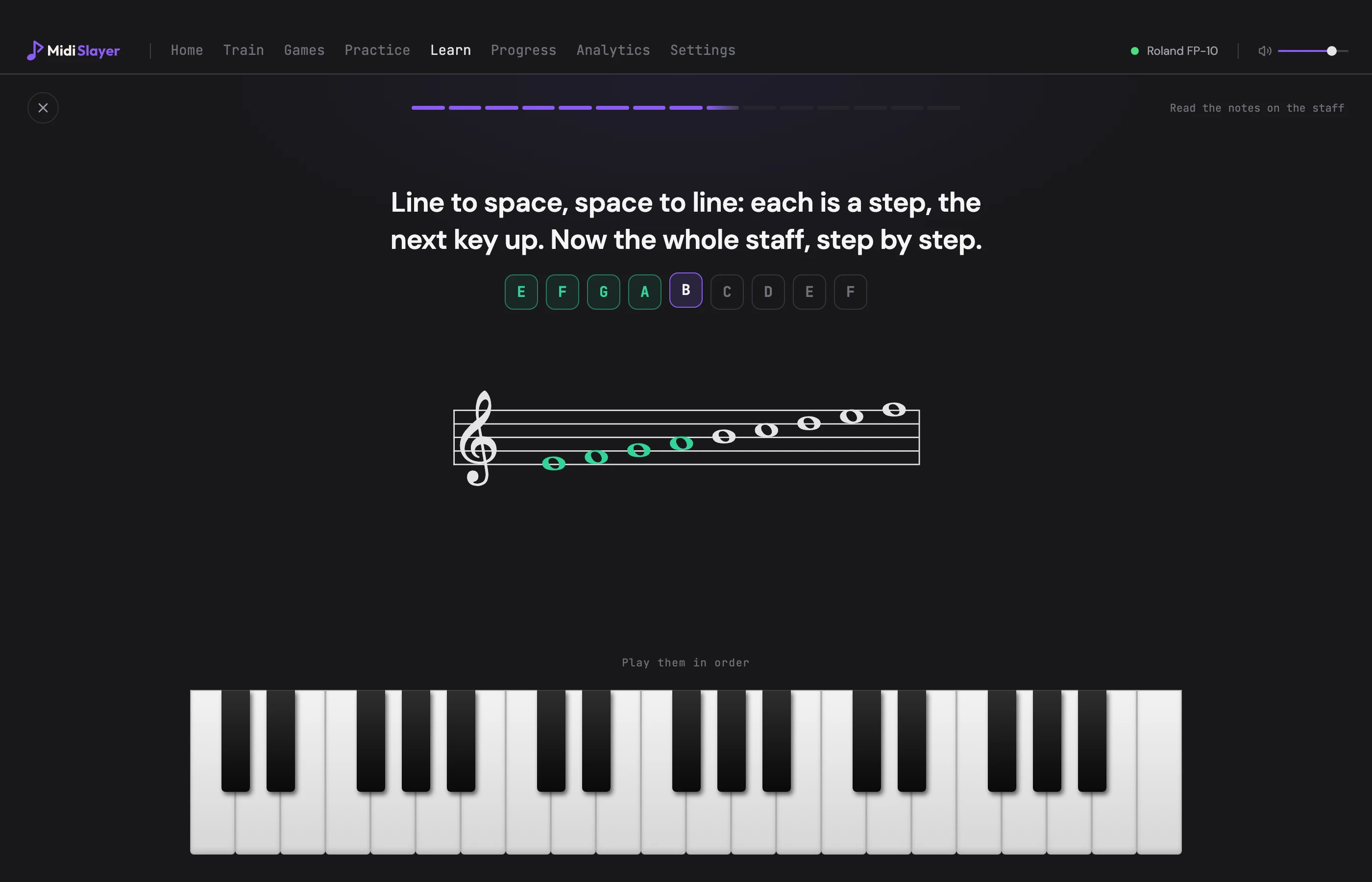 A MidiSlayer lesson walking up the treble staff from E to F, the first four notes played and marked green, B next